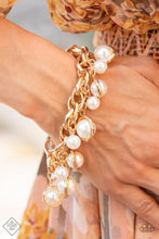 Load image into Gallery viewer, Orbiting Opulence Gold Pearl Bracelet Paparazzi-206
